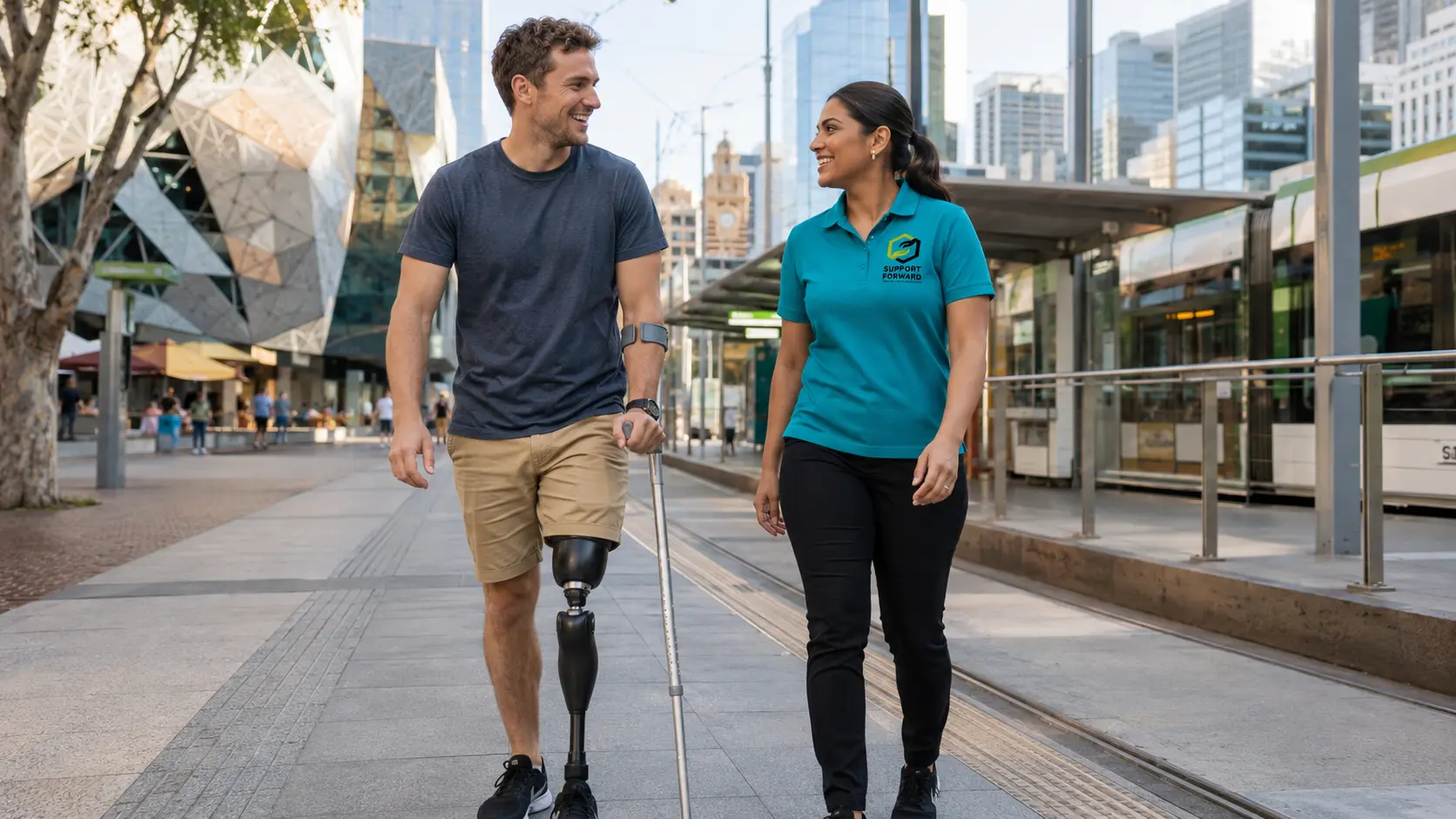 Support worker and participant at Melbourne tram stop — transport support